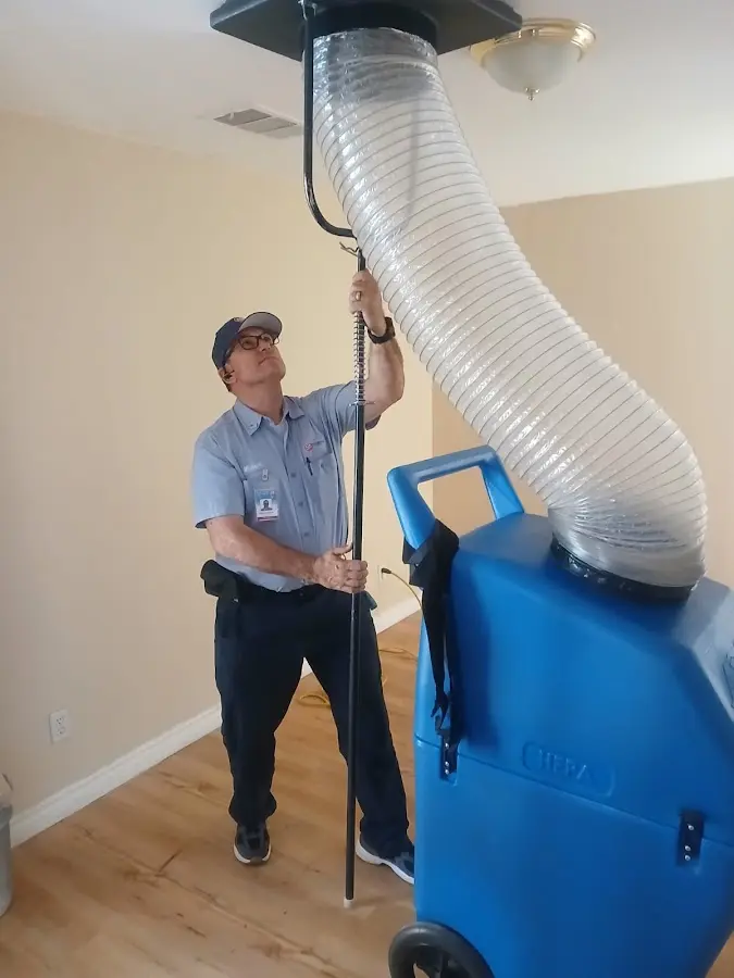 HVAC Installation technician using HEPA equipment in Eliot